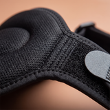 Close-up of the velcro strap and pressure pad