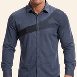 Shoulder brace worn under a buttoned shirt